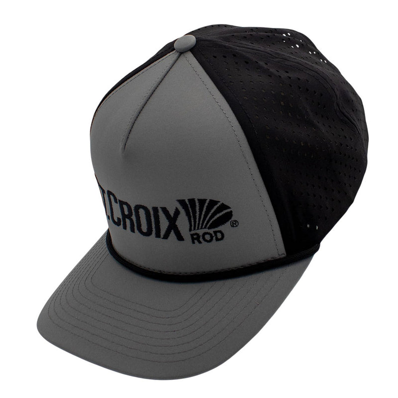 Side of a grey hat with a black back and a black st. croix logo on the front.