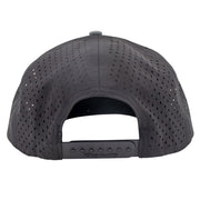 Black perforated back panels of a hat with a snap back closure.