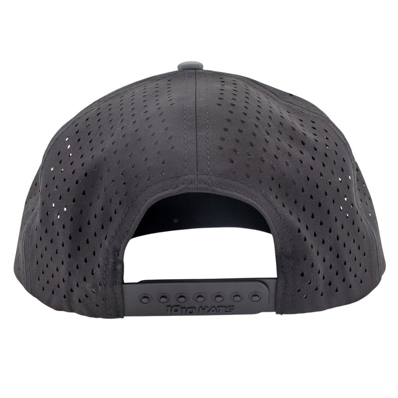 Black perforated back panels of a hat with a snap back closure.