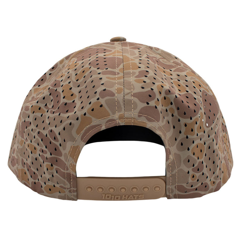 Tan camouflage-patterned cap with perforated back panels and a snap back closure.