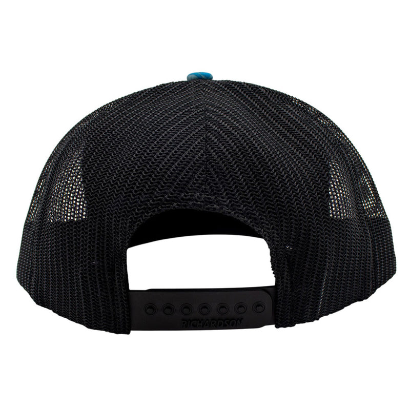 Black mesh back panels of a cap.