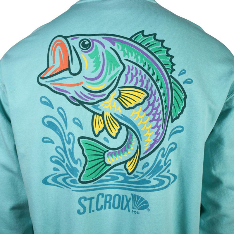 A close-up of the back of a light aqua long-sleeve shirt featuring a large graphic of a jumping largemouth bass in green, purple, yellow, and orange, with blue water splashes and the St. Croix logo printed below.