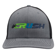 A heather gray trucker cap with black mesh back panels and a curved brim, featuring a prominent 'GX CRUSH' embroidered logo on the front.