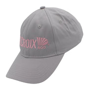 Side of a light gray baseball cap with pink embroidered text on the front.